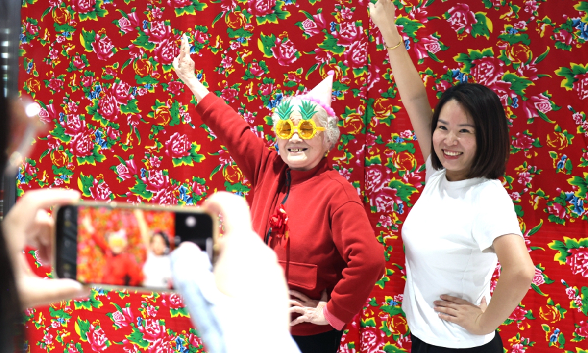 People pose for photos in Luoyang, Central China's Henan Province.  Photo: VCG