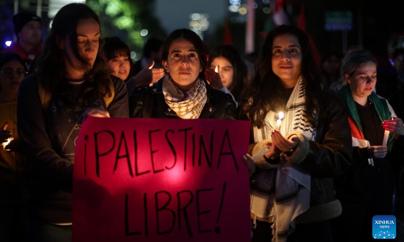 People participate in a vigil in support of Palestine, calling for an end to the conflict in the Middle East, in Mexico City, Mexico, on Oct. 7, 2024. (Photo: Xinhua)