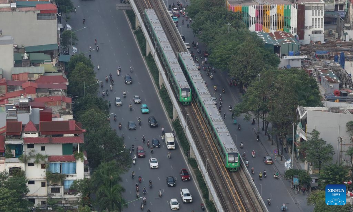 Trains run on the Cat Linh-Ha Dong urban elevated railway in Hanoi, Vietnam, Oct. 9, 2024. The Cat Linh-Ha Dong urban elevated railway was built by the China Railway Sixth Group as an important project of the synergy of China's Belt and Road Initiative with Vietnam's Two Corridors and One Economic Circle plan. (Photo: Xinhua)