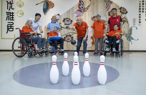 Elderly residents at a nursing home participate in a bowling match to welcome the Chongyang Festival in Hefei, Anhui Province, on September 27, 2024. Photo: VCG