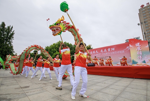 Dancers perform a dragon dance at an event to celebrate the Chongyang Festival in Luohe, Henan Province, on September 30, 2024. Photo: VCG