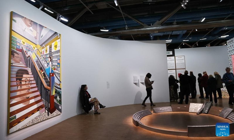 People visit the exhibition China: A new generation of artists during a press tour at the Centre Pompidou in Paris, France, Oct. 8, 2024. The exhibition, featuring works by Chinese artists born between the late 1970s and the early 1990s, opens to the public from Oct. 9, 2024 to Feb. 3, 2025 (Photo: Xinhua)