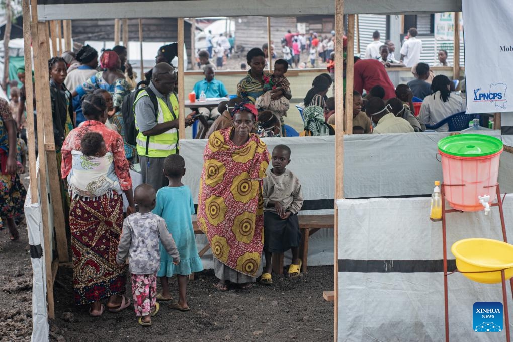 People wait to get vaccinated at a vaccination center near a camp for internally displaced persons in Goma, North Kivu Province, the Democratic Republic of the Congo (DRC), on Oct. 9, 2024. Around 940,000 people have been displaced this year in the Democratic Republic of the Congo (DRC), UN High Commissioner for Human Rights Volker Turk said on Tuesday. (Photo: Xinhua)