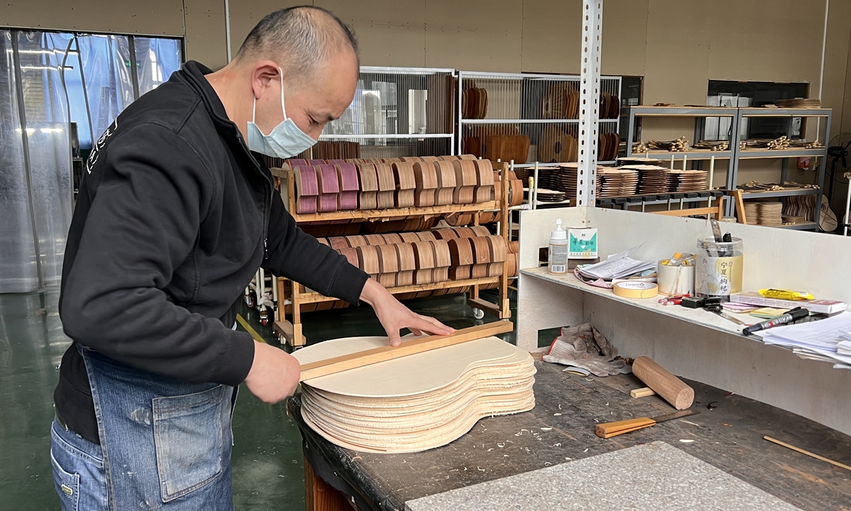 Guitar craftsman Yu Yangqing works at the manufacturing shop of Natasha Music company in Zheng'an, Southwest China's Guizhou Province on October 4, 2024. Photo: Leng Shumei/Global Times