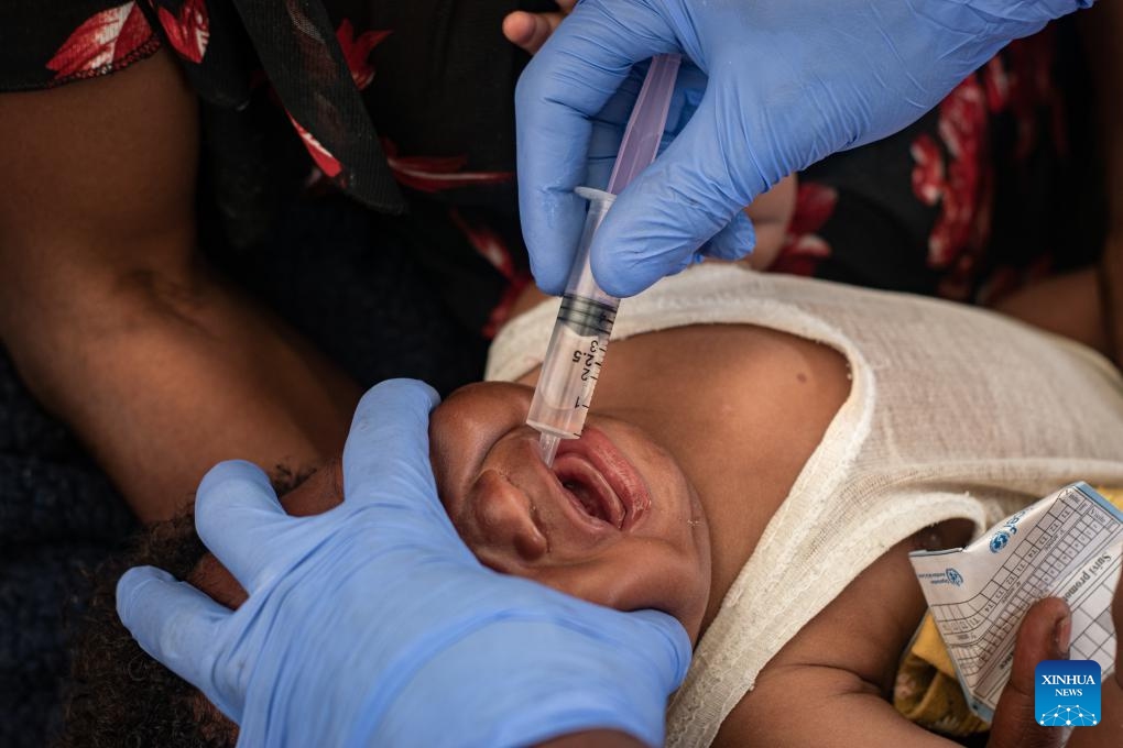 A child is vaccinated at a vaccination center near a camp for internally displaced persons in Goma, North Kivu Province, the Democratic Republic of the Congo (DRC), on Oct. 9, 2024. Around 940,000 people have been displaced this year in the Democratic Republic of the Congo (DRC), UN High Commissioner for Human Rights Volker Turk said on Tuesday. (Photo: Xinhua)