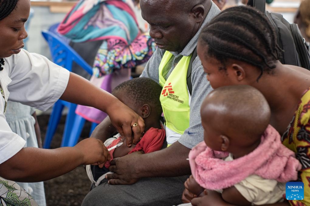 A child is vaccinated at a vaccination center near a camp for internally displaced persons in Goma, North Kivu Province, the Democratic Republic of the Congo (DRC), on Oct. 9, 2024. Around 940,000 people have been displaced this year in the Democratic Republic of the Congo (DRC), UN High Commissioner for Human Rights Volker Turk said on Tuesday. (Photo: Xinhua)