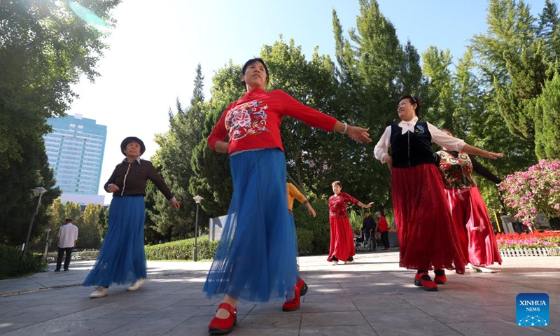 A dance team of senior citizens rehearse at a park in Shijiazhuang, north China's Hebei Province, Oct. 10, 2024. A series of celebration activities were held across the country to mark the country's Seniors' Day, which falls on Oct. 11 this year. (Photo: Xinhua)