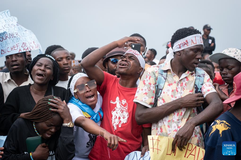 People mourn during a funeral for victims of a recent ferry accident in Goma, the capital of the North Kivu Province in the eastern Democratic Republic of the Congo (DRC), on Oct. 10, 2024. (Photo: Xinhua)