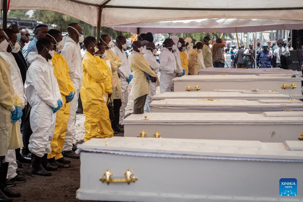 Pallbearers stand in front of coffins during a funeral for victims of a recent ferry accident in Goma, the capital of the North Kivu Province in the eastern Democratic Republic of the Congo (DRC), on Oct. 10, 2024. (Photo: Xinhua)