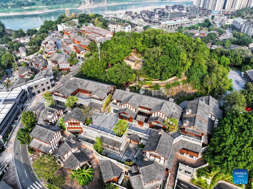 An aerial drone photo taken on Oct. 9, 2024 shows a view of the Ciqikou ancient town in southwest China's Chongqing Municipality. Located by the Jialing River in Chongqing, the ancient town of Ciqikou was first built in the Northern Song Dynasty (960-1127). In recent years, local authorities have advanced the integration of cultural and tourism development and the urban renewal, while preserving the authentic charm of the ancient town. (Photo: Xinhua)