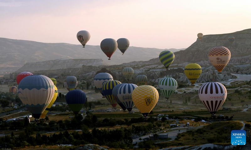 Hot air balloons are seen in Cappadocia, Türkiye on Oct. 9, 2024. (Photo: Xinhua)