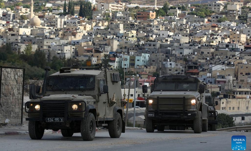 Vehicles of Israeli forces are seen on a street during an Israeli operation in Far'a refugee camp, south of the West Bank City of Tubas, on Oct. 10, 2024. (Photo: Xinhua)