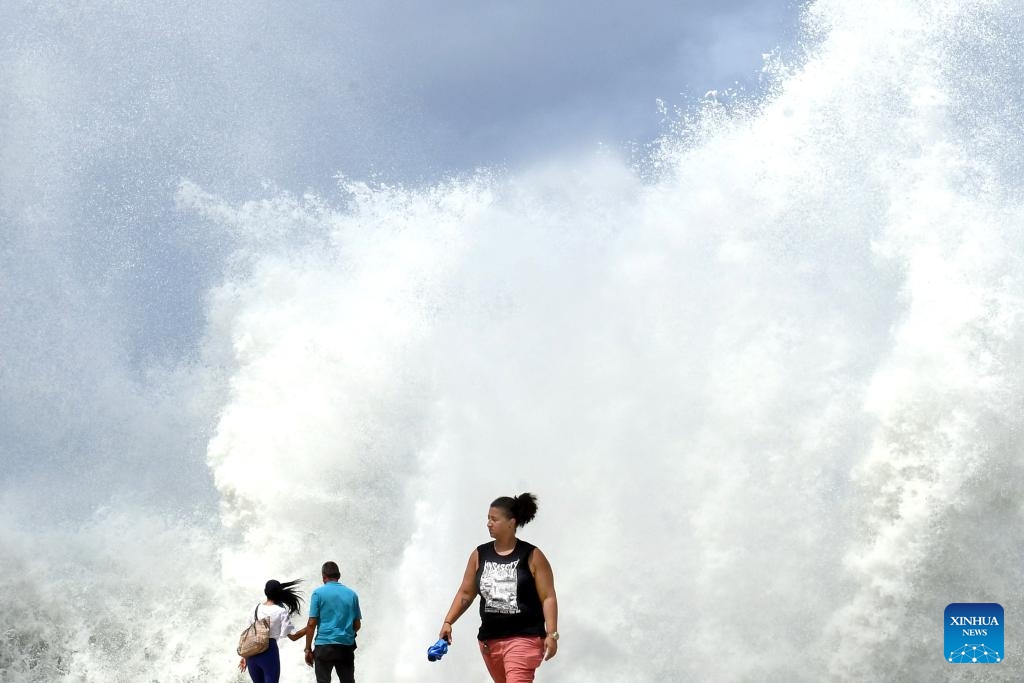 Huge waves are seen along a seaside road in Havana, Cuba, Oct. 9, 2024. Hurricane Milton brought intermittent rainfall to Cuba. (Photo: Xinhua)