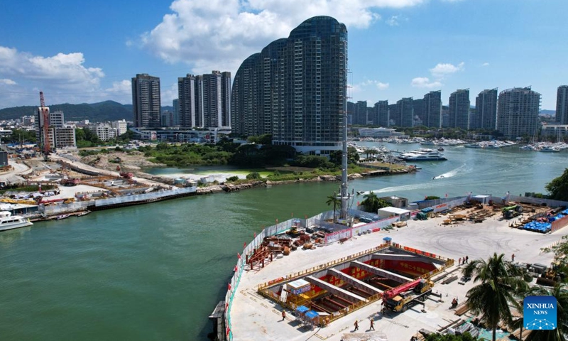 A drone photo shows the construction site of the Sanya River estuary passage project in Sanya, south China's Hainan Province, Oct. 12, 2024. The Sanya River estuary passage project undertaken by China Railway 20th Bureau Group is making steady progress. As the first underwater tunnel in Sanya, the project will further optimize the urban spatial layout and facilitate the development of the Hainan Free Trade Port. (Photo: Xinhua)