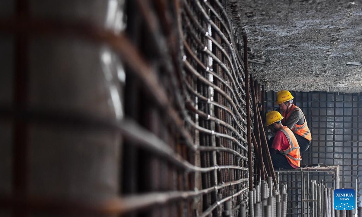 Workers work at the construction site of the Sanya River estuary passage project in Sanya, south China's Hainan Province, Oct. 12, 2024. The Sanya River estuary passage project undertaken by China Railway 20th Bureau Group is making steady progress. As the first underwater tunnel in Sanya, the project will further optimize the urban spatial layout and facilitate the development of the Hainan Free Trade Port. (Photo: Xinhua)