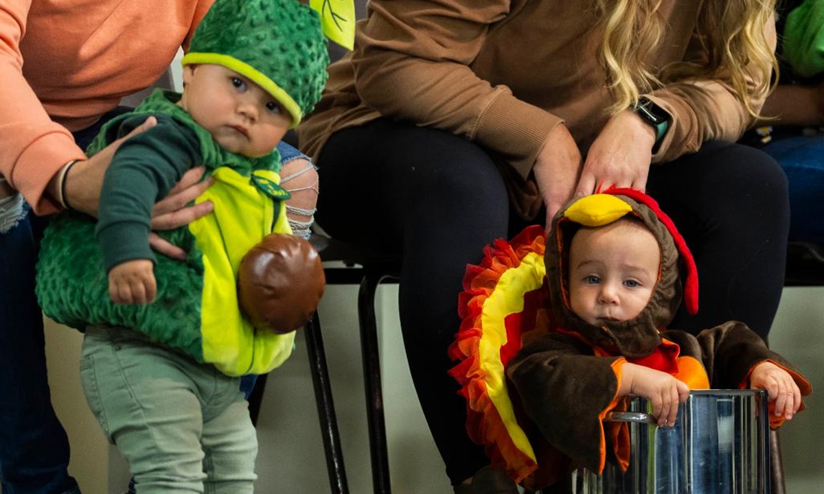 Babies in costumes are seen during a baby show held at the Burford Fall Fair in Burford, Ontario, Canada, on Oct. 13, 2024.  (Photo: Xinhua)