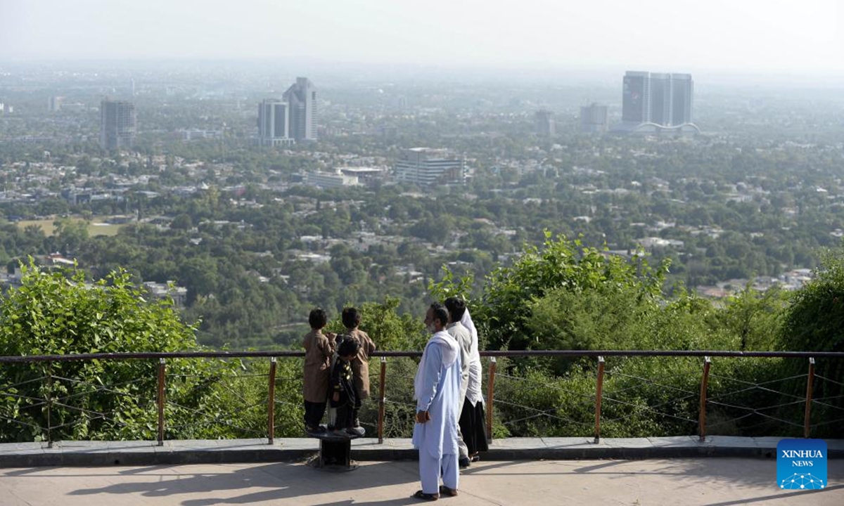 People visit Daman-e-Koh viewpoint in Islamabad, capital of Pakistan, Oct. 12, 2024. (Photo: Xinhua)