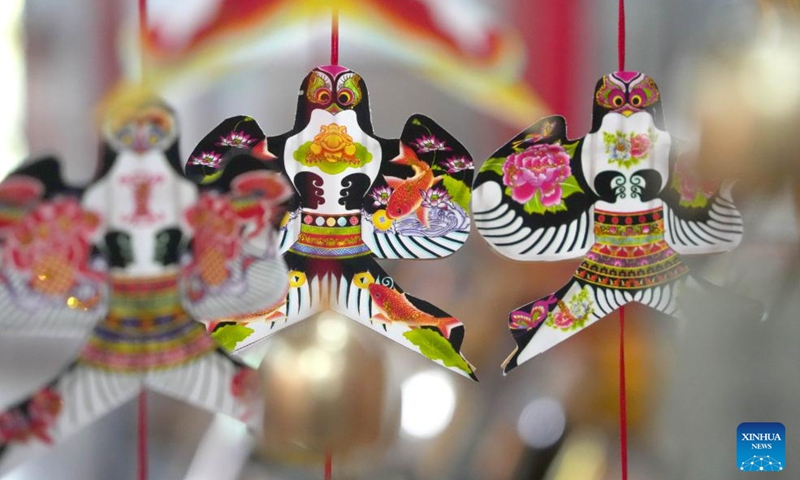 Creative cultural products themed on kites are pictured at a kite workshop in Hanting District of Weifang, east China's Shandong Province, Oct. 14, 2024. The kite culture and thriving kite industry in Weifang have a long and rich history. In 2006, the manufacturing skill of Weifang kites was listed as a national intangible cultural heritage. (Photo: Xinhua)