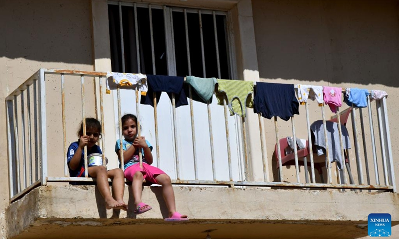 Children fleeing from Lebanon are seen at the Harjalleh shelter center in the countryside of Damascus, Syria, on Oct. 14, 2024. The shelter center, hosting hundreds of displaced families, is managed by the Syrian government, providing essential services such as food, medical care, vaccinations for children, and access to education. (Photo: Xinhua)