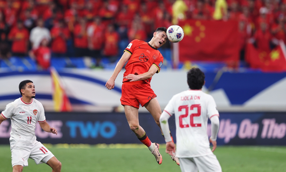 Baihelamu Abuduwaile vies for the header during the match against Indonesia on October 15, 2024 in Qingdao, East China's Shandong Province. Photo: Cui Meng/GT