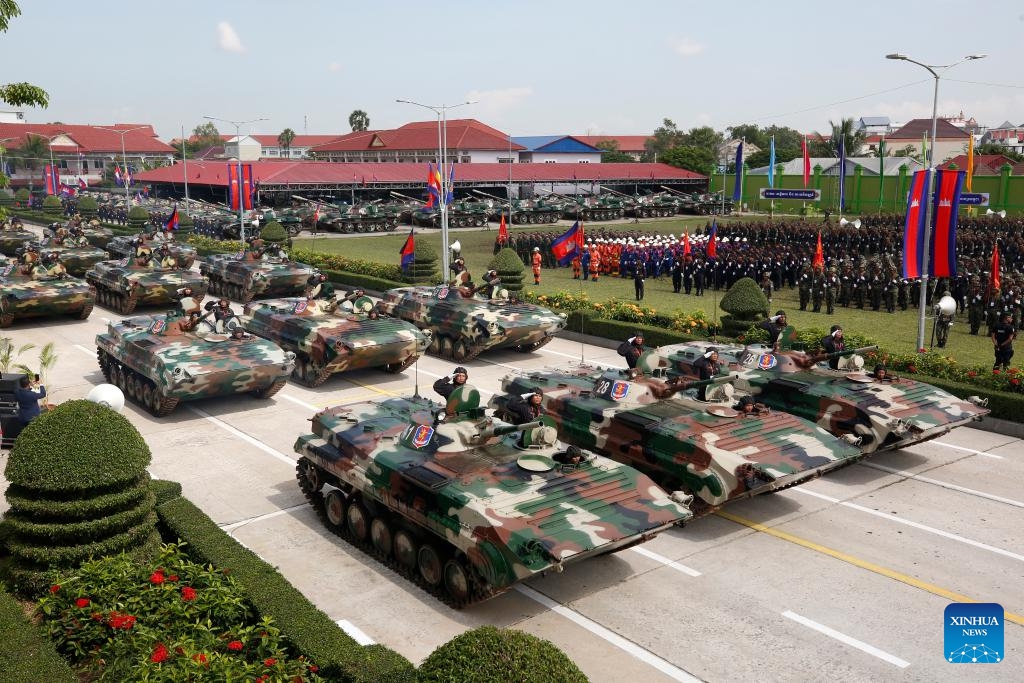 Military vehicles parade during the celebration of the 30th founding anniversary of the Brigade 70 in Phnom Penh, Cambodia on Oct. 15, 2024. The Brigade 70, an elite Royal Cambodian Armed Forces (RCAF) unit, commemorated its 30th founding anniversary on Tuesday, vowing to continue to safeguard the country's peace, security, stability and development. (Photo: Xinhua)