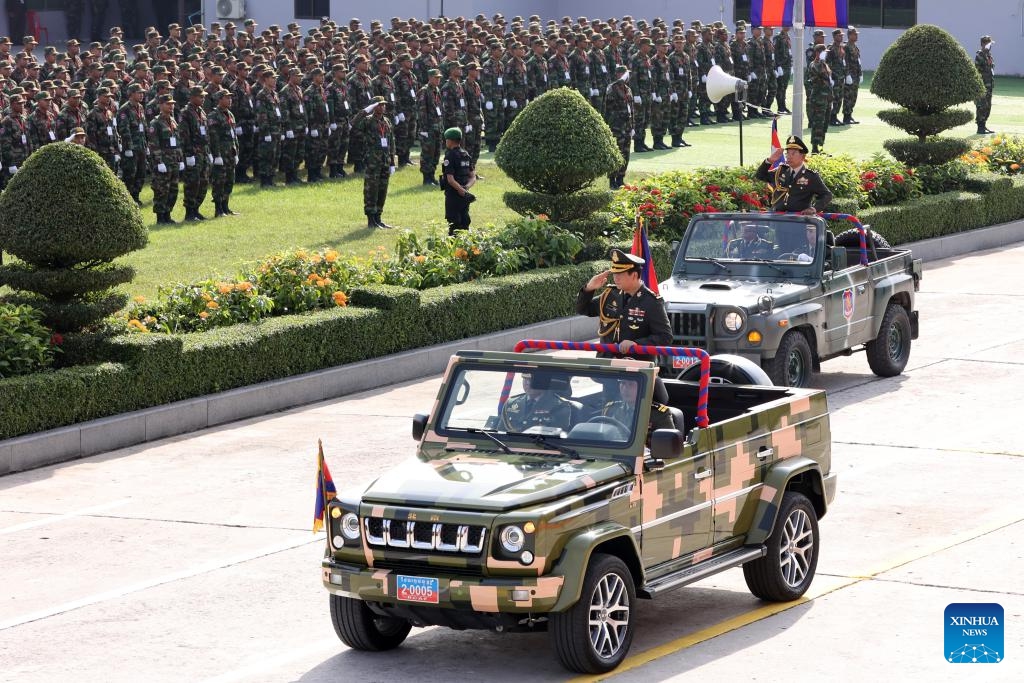 Cambodian Prime Minister Hun Manet (front jeep) inspects troops during the celebration of the 30th founding anniversary of the Brigade 70 in Phnom Penh, Cambodia on Oct. 15, 2024. The Brigade 70, an elite Royal Cambodian Armed Forces (RCAF) unit, commemorated its 30th founding anniversary on Tuesday, vowing to continue to safeguard the country's peace, security, stability and development. (Photo: Xinhua)