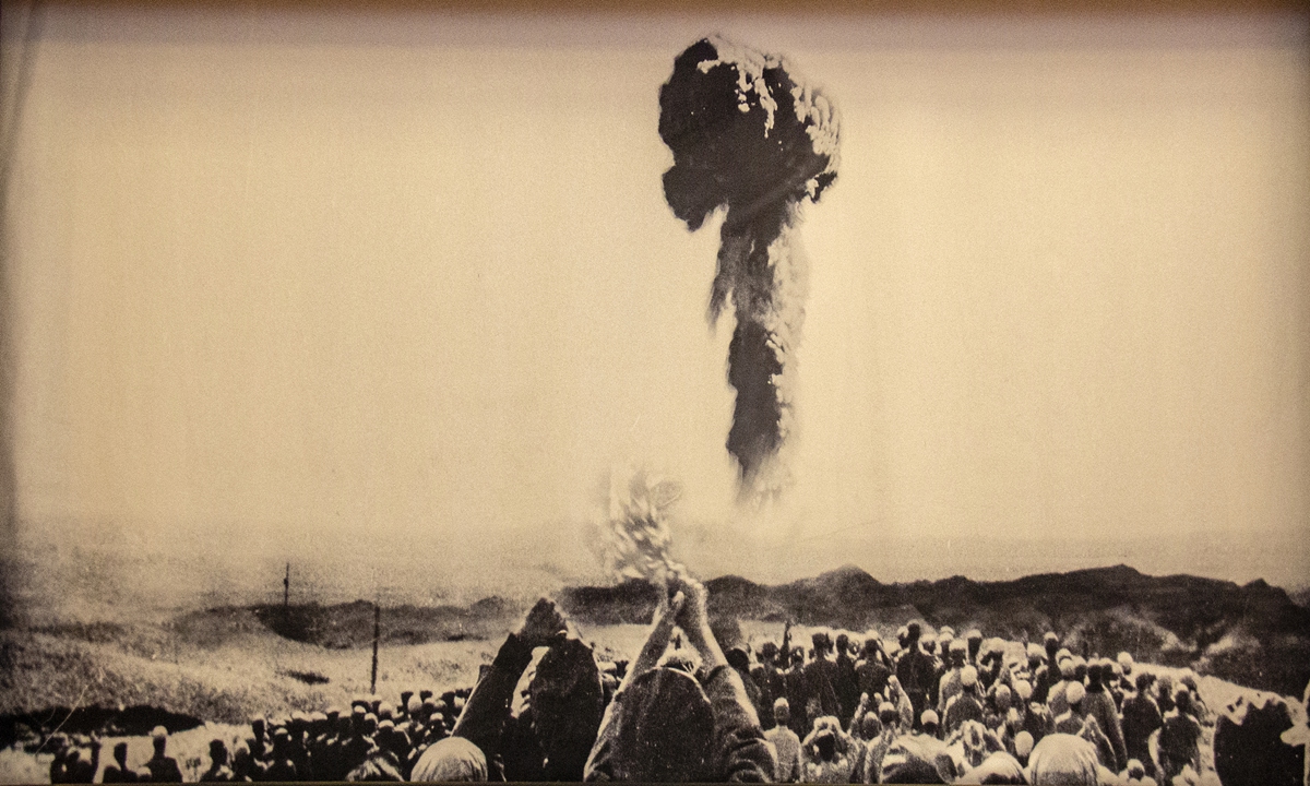 People cheer as China successfully detonates its first atomic bomb, on October 16, 1964.  Photo: VCG