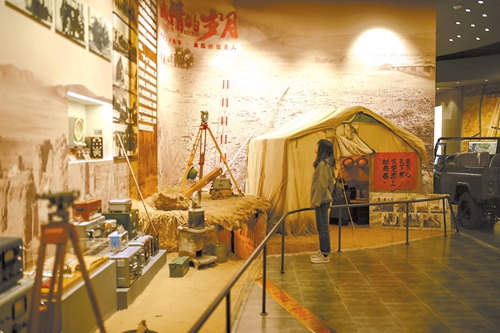 A visitor attends an exhibition about the hardships of past local life at the Plant 404 exhibition hall in Northwest China's Gansu Province, on September 27, 2024. Photo: Shan Jie/GT