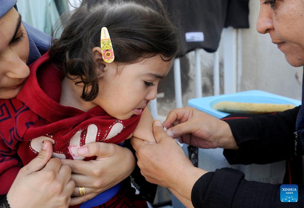 A Lebanese child is vaccinated at the Herjalleh shelter in the countryside of Damascus, Syria, on Oct. 16, 2024. (Photo:Xinhua)