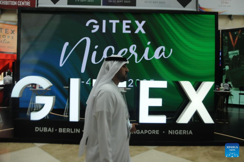 A man walks past a sign of the Gulf Information Technology Exhibition (GITEX) in Dubai, the United Arab Emirates, on Oct. 17, 2024. (Photo: Xinhua)