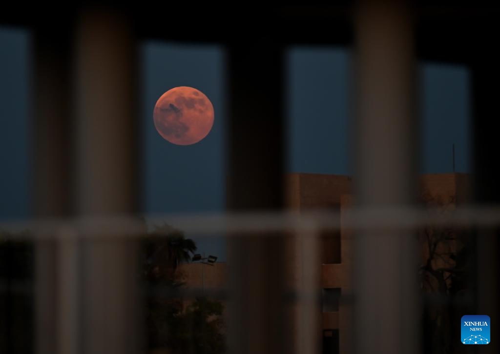 A full moon is seen in the sky over Kuwait City, Kuwait, on Oct. 17, 2024. (Photo: Xinhua)