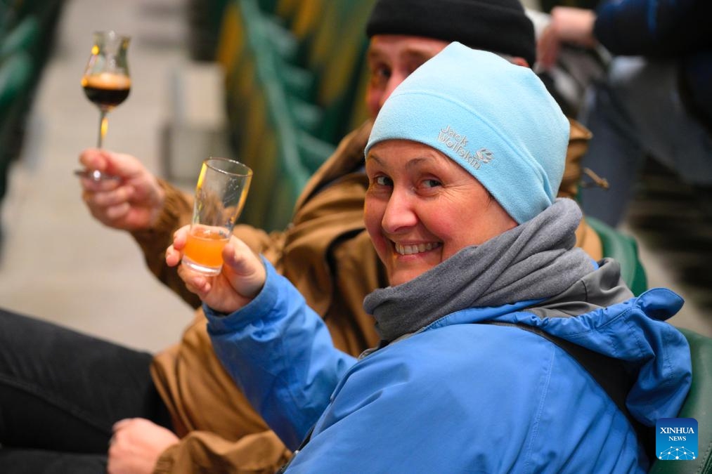 People enjoy beer at the Warsaw Beer Festival in Warsaw, Poland, on Oct. 17, 2024. (Photo: Xinhua)