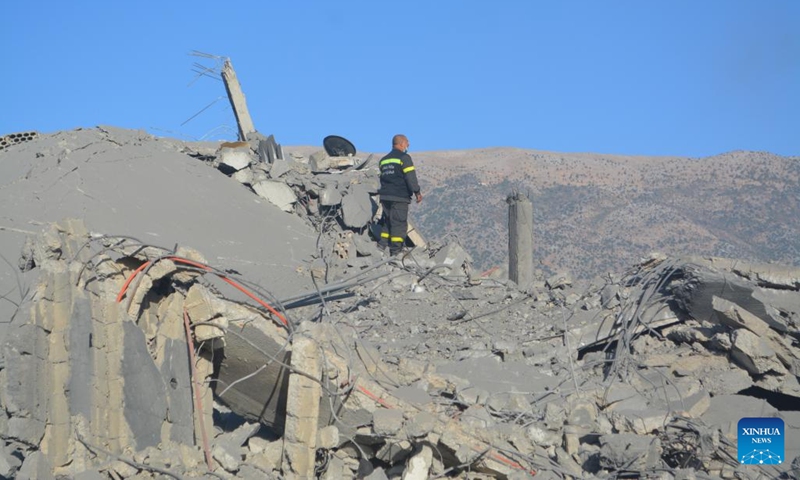 Emergency workers check the destruction caused by Israeli airstrikes in Sahmar, Lebanon, on Oct. 15, 2024. The death toll from Israeli airstrikes on Lebanon since the beginning of the Hezbollah-Israeli conflict on Oct. 8, 2023, reached 2,367, while injuries went up to 11,088, the Lebanese Health Ministry said on Wednesday. (Photo: Xinhua)