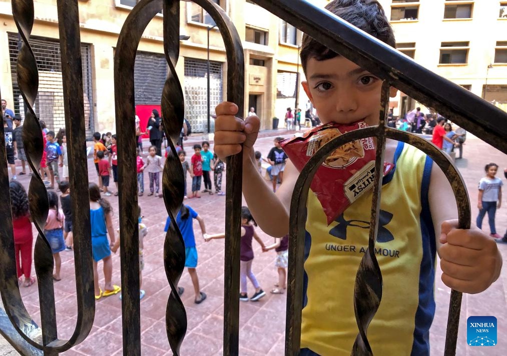 A displaced child is seen in Beirut, Lebanon, Oct. 15, 2024. The total number of displaced persons in Lebanon due to Israeli airstrikes has risen to nearly 1.2 million, according to a report has been released by the Disaster Risk Management Unit at the Lebanese Council of Ministers recently. (Photo: Xinhua)