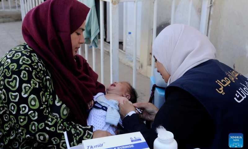 A Lebanese child is vaccinated at the Herjalleh shelter in the countryside of Damascus, Syria, on Oct. 16, 2024. (Photo:Xinhua)