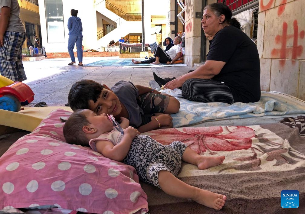 Displaced people are seen in Beirut, Lebanon, Oct. 15, 2024. The total number of displaced persons in Lebanon due to Israeli airstrikes has risen to nearly 1.2 million, according to a report has been released by the Disaster Risk Management Unit at the Lebanese Council of Ministers recently. (Photo: Xinhua)