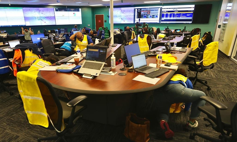 People practice Drop, Cover and Hold On during an earthquake preparedness drill in Los Angeles County, California, the United States, on Oct. 17, 2024. (Photo: Xinhua)