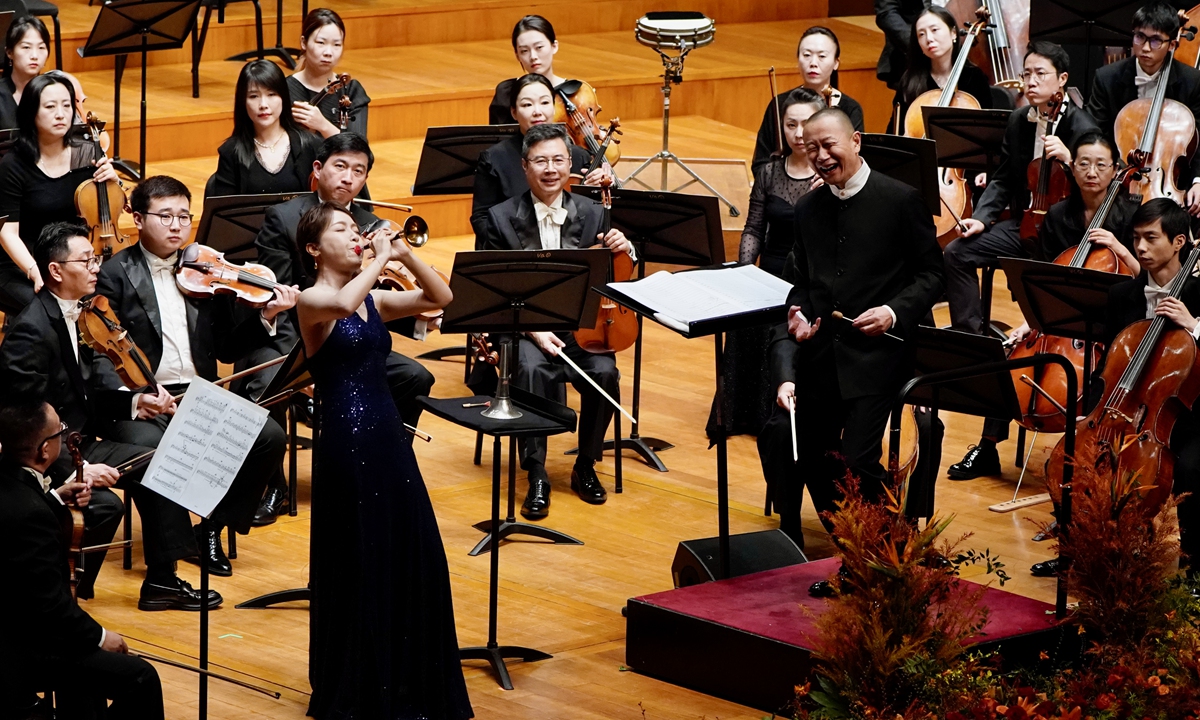 Conducted by Tan Dun, the China National Symphony Orchestra performs the <em>Ancient Bells of Peking's Central Axis</em> in Beijing. Photo: Courtesy of the Beijing Music Festival