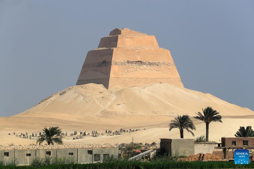 This photo taken on Oct. 16, 2024 shows a view of the Meidum Pyramid in Beni Suef Governorate, Egypt. Meidum Pyramid is thought to be built by Pharaoh Sneferu, the first pharaoh of the Fourth Dynasty of ancient Egypt. The pyramid has a history of around 4,600 years. (Photo:Xinhua)