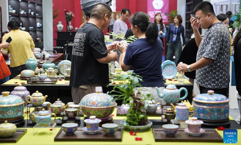 People visit the 2024 China Jingdezhen International Ceramic Expo in Jingdezhen, east China's Jiangxi Province, Oct. 18, 2024. The 2024 China Jingdezhen International Ceramic Expo kicked off on Friday in Jingdezhen, renowned worldwide as the porcelain capital, in east China's Jiangxi Province. (Photo: Xinhua)