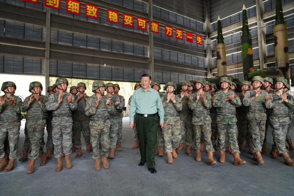 Chinese President Xi Jinping, also general secretary of the Communist Party of China Central Committee and chairman of the Central Military Commission, talks to officers and soldiers of a brigade while examining its training in operating the arms, on Oct. 17, 2024. Xi inspected a brigade of the Chinese People's Liberation Army Rocket Force on Thursday. (Photo: Xinhua)