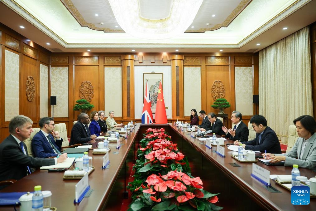 Chinese Foreign Minister Wang Yi, also a member of the Political Bureau of the Communist Party of China Central Committee, holds talks with Secretary of State for Foreign, Commonwealth and Development Affairs of the United Kingdom David Lammy in Beijing, capital of China, Oct. 18, 2024. (Photo: Xinhua)