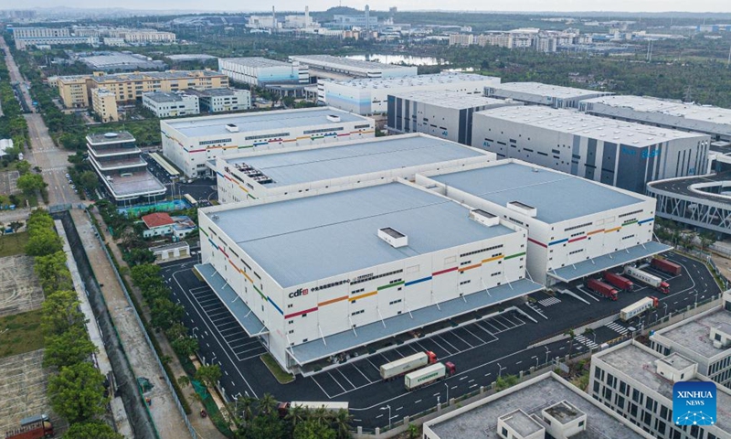 An aerial drone photo taken on Oct. 18, 2024 shows a logistics center in Chengmai County, south China's hainan Province. In the first three quarters of this year, Hainan's total goods imports and exports hit 205.95 billion yuan (about 29 billion U.S. dollars), a 20.2 percent increase over the same period last year, according to official data released recently by Haikou Customs. (Photo: Xinhua)