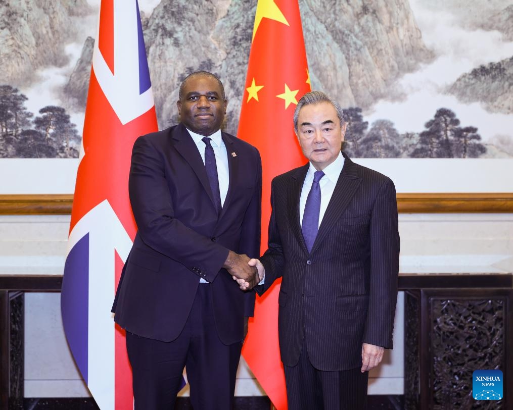 Chinese Foreign Minister Wang Yi, also a member of the Political Bureau of the Communist Party of China Central Committee, holds talks with Secretary of State for Foreign, Commonwealth and Development Affairs of the United Kingdom David Lammy in Beijing, capital of China, Oct. 18, 2024. (Photo: Xinhua)