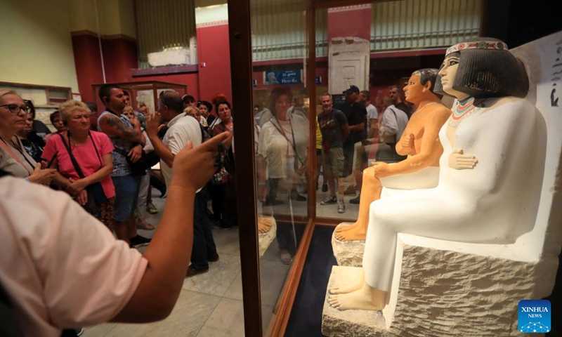 Tourists look at exhibits at Egyptian Museum in Cairo, Egypt, on Oct. 18, 2024. Egypt has entered its peak tourism season as the weather becomes cooler.  (Photo: Xinhua)