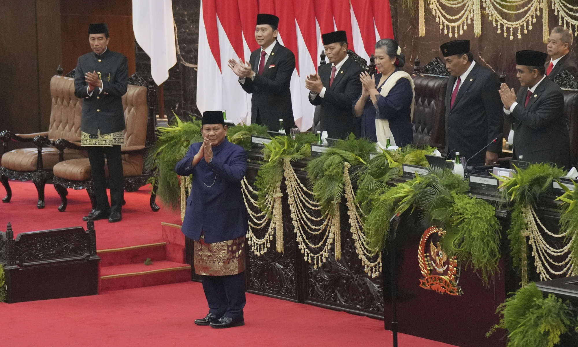 Newly inaugurated Indonesian President Prabowo Subianto reacts as his predecessor Joko Widodo (left) and leaders of the People's Consultative Assembly applaud after Subianto was sworn in as the country's eighth president at the parliament building in Jakarta, Indonesia, on October 20, 2024. Photo: VCG