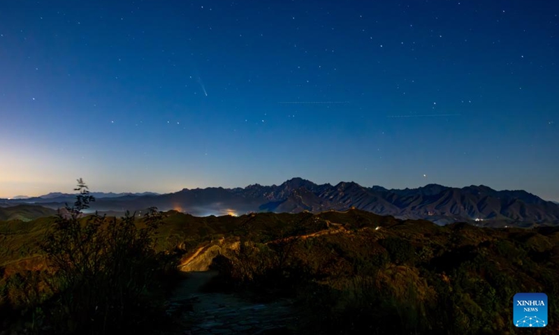 The comet C/2023 A3 (Tsuchinshan-ATLAS) is seen in the sky above the Panlongshan section of the Great Wall in Beijing, capital of China, Oct. 19, 2024. (Photo: Xinhua)