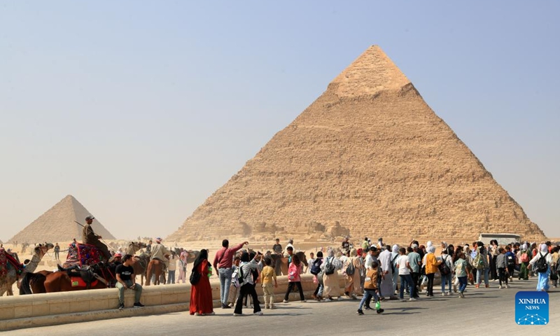 Tourists visit the Giza Pyramids scenic spot in Giza, Egypt, on Oct. 19, 2024. Egypt has entered its peak tourism season as the weather becomes cooler.  (Photo: Xinhua)