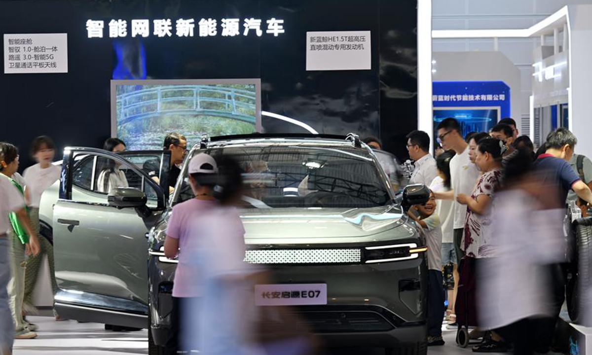 People visit the booth of Chang'an Auto at the World Intelligence Expo 2024 in north China's Tianjin, June 22, 2024. Photo: Xinhua