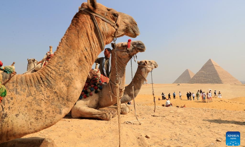 Tourists visit the Giza Pyramids scenic spot in Giza, Egypt, on Oct. 19, 2024. Egypt has entered its peak tourism season as the weather becomes cooler.  (Photo: Xinhua)